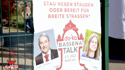Posterframe von Bassena Talk: Stau neben Stauden oder bereit für breite Straßen
