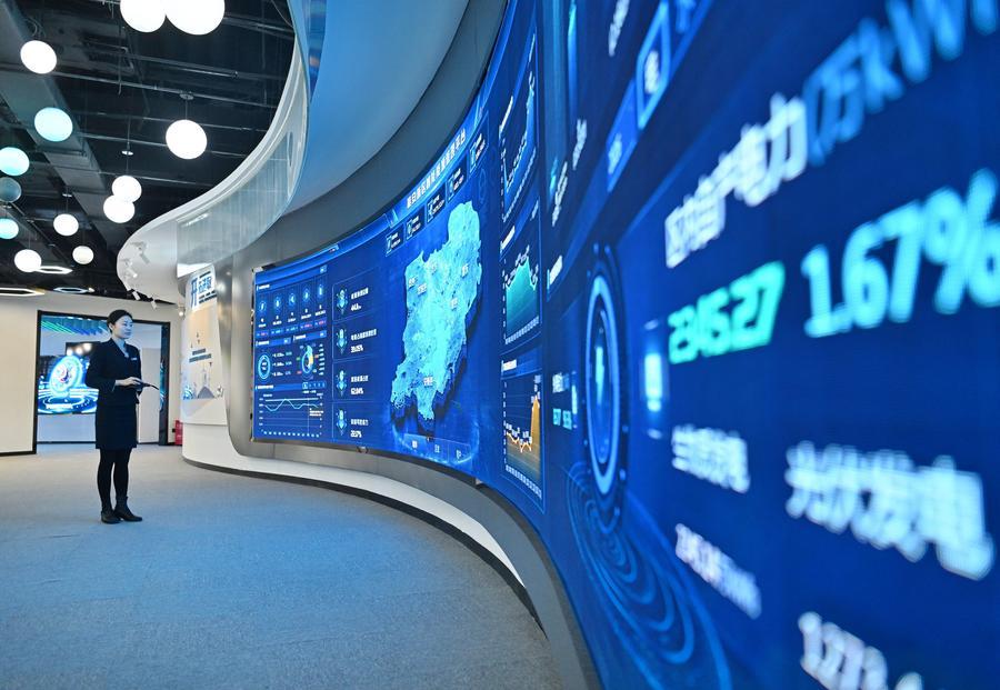 a staff member works at a control center